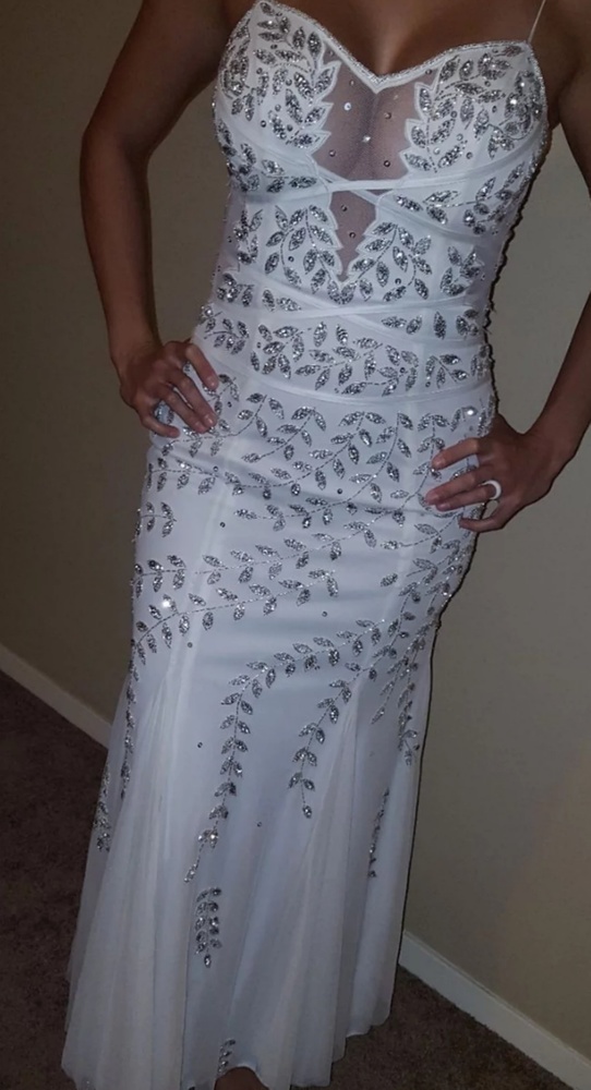 White beaded evening gown.